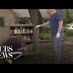 Couple creates free meals pantry on entrance garden for neighbors in need